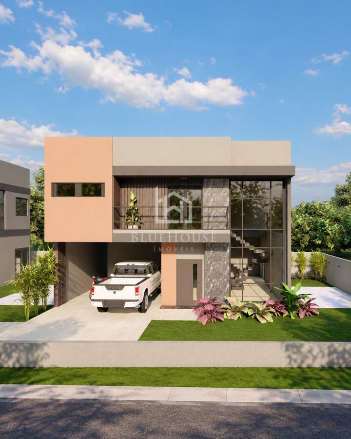 Casa moderna com fachada de combinações de cores neutras, vidro e pedra