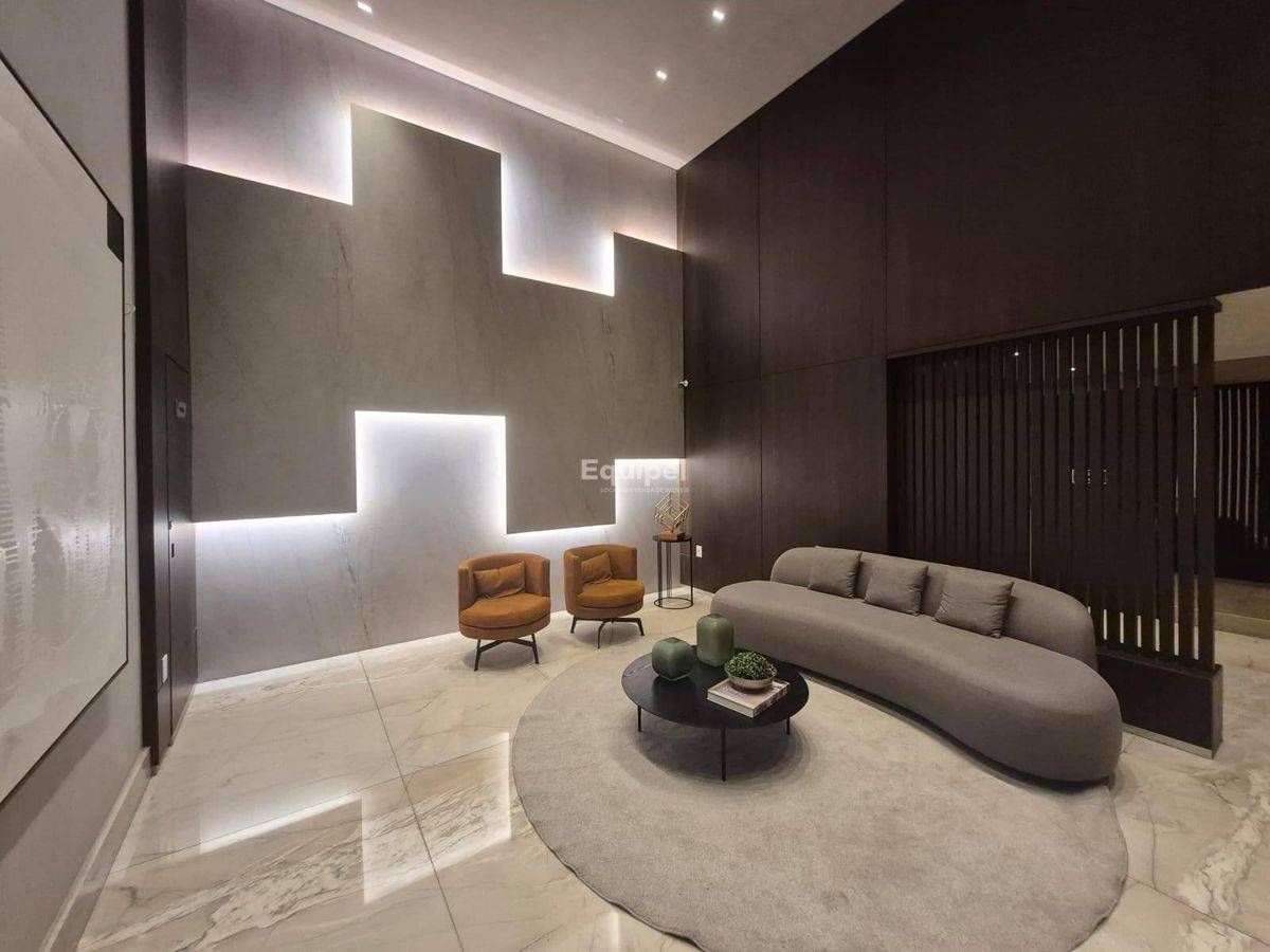 Sala moderna com paredes de concreto, iluminação indireta, móveis acolhedores