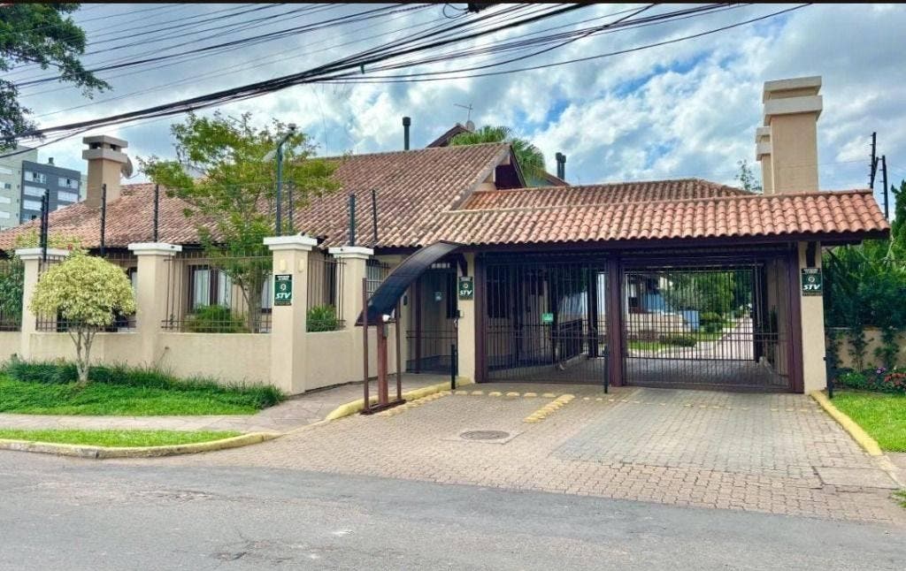 Casa com 4 dormitórios à venda por R$ 1.480.000,00 - Marechal Rondon - Canoas/RS - Casa em Marechal Rondon, Canoas - à venda - COELHO IMOBILIÁRIA LTDA