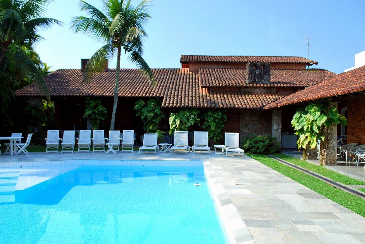 Villa Condim — A Esquina Mais Desejada do Jardim Acapulco - Casa de Condomínio em Acapulco, Guarujá - à venda - G.K.N EMPREENDIMENTOS E PARTICIPAÇÕES IMOBILIÁRIAS LTDA