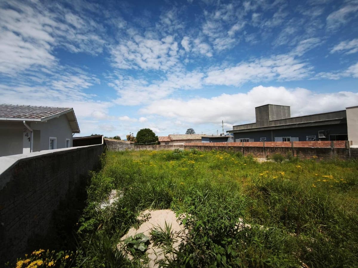 TERRENO ESCRITURADO - APTO À FINANCIAMENTO - Lote/Terreno em Imbituba - à venda - Casa dos Imóveis Administração Imobiliária LTDA