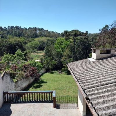 Casa com terreno amplo (605m²) e com uma enorme área externa, localizada no bairro Pilarzinho (bairro tranquilo e seguro). - Casa em Pilarzinho, Curitiba - à venda - SCHAEFER IMOVEIS LTDA